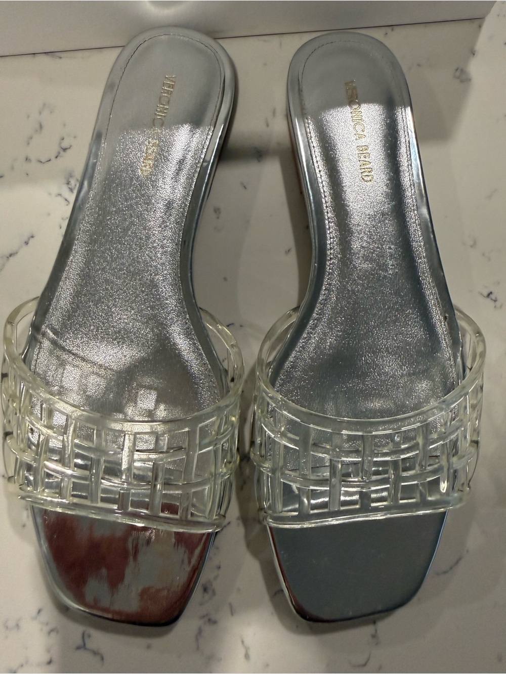 Veronica Beard Silver Metallic Slide Mules with Clear Woven Straps